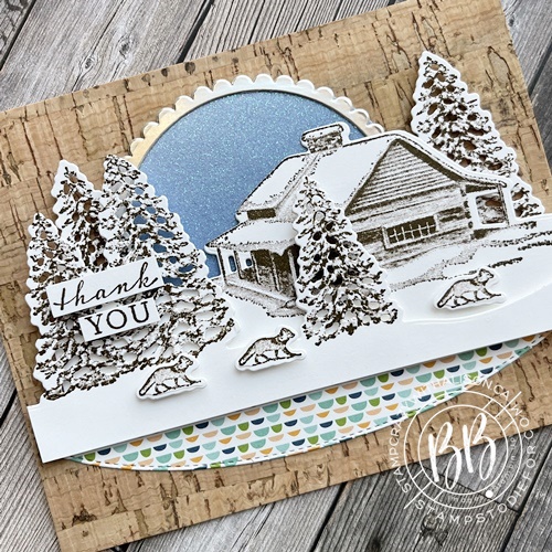 Peaceful cabin in the woods card using the stamp set and Cabin Dies along with the glimmer and cork paper by Stampin' Up!